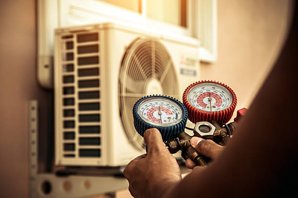 Professional Heat Pump Repair technician working in Fredonia, WI